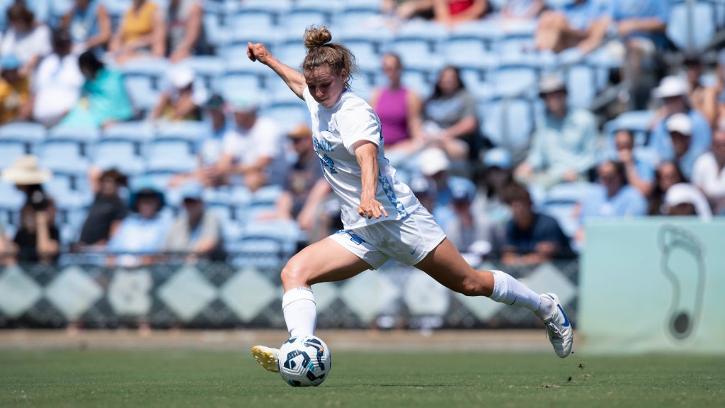 Pittsburgh Riveters first ever signing Tessa Dellarose dribbling a soccer ball while playing for the University of North Carolina 